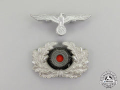 Germany. A Second War Period Wehrmacht Heer (Army) Set Of Officer’s Visor Cap Insignia