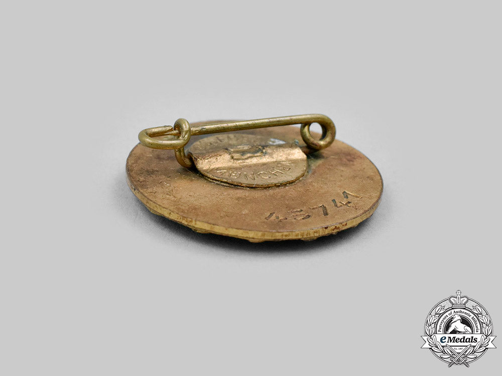 germany,_nsdap._a_golden_party_badge,_small_version,_by_josef_fuess_c2020_062_mnc0687