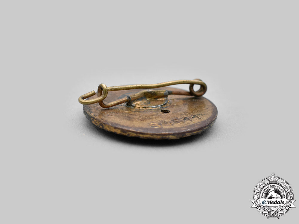 germany,_nsdap._a_nsdap_golden_party_badge,_small_version_by_deschler&_sohn,_to_herbert_ruck_c2020_448_mnc9621