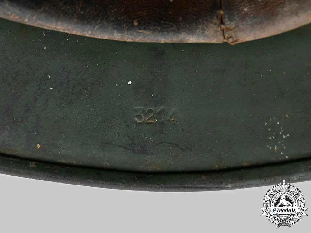 germany,_heer._a_battle-_damaged_heer_m40_steel_helmet_c2020_480_mnc9358_1_1_1_1_1