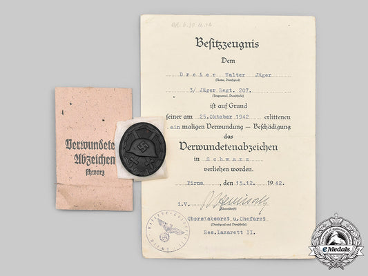 germany,_heer._a_black_grade_wound_badge,_with_award_document,_to_walter_jäger_c2021_046_mnc9393