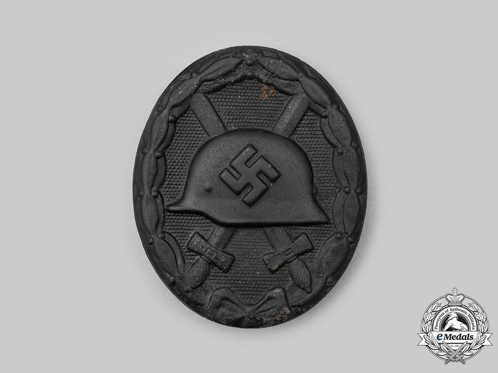 germany,_heer._a_black_grade_wound_badge,_with_award_document,_to_walter_jäger_c2021_047_mnc9401
