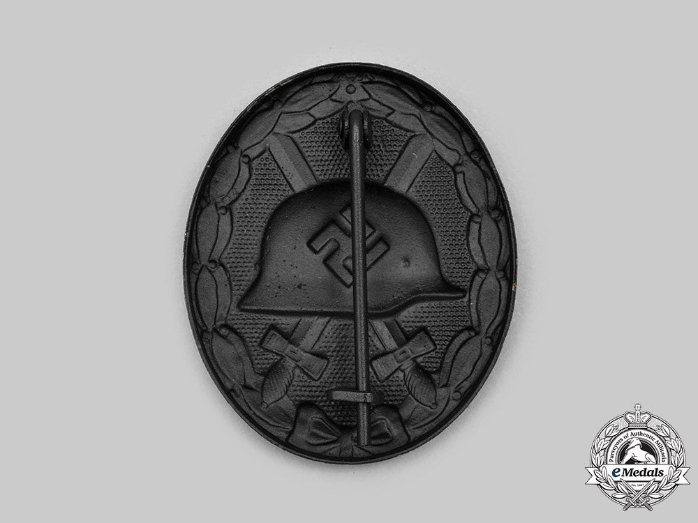 germany,_heer._a_black_grade_wound_badge,_with_award_document,_to_walter_jäger_c2021_048_mnc9403