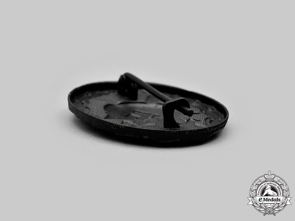 germany,_heer._a_black_grade_wound_badge,_with_award_document,_to_walter_jäger_c2021_049_mnc9405