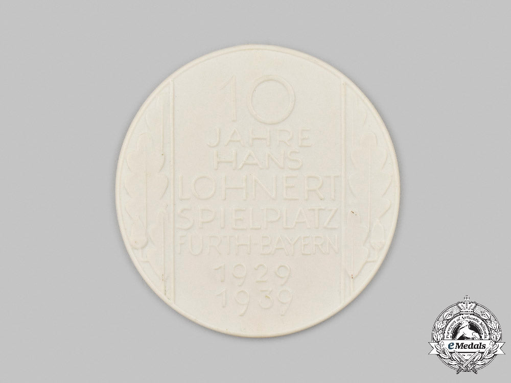 germany,_third_reich._a_hans_lohnert_sports_field10-_year_anniversary_table_medal,_with_case_c2021_083_mnc8108