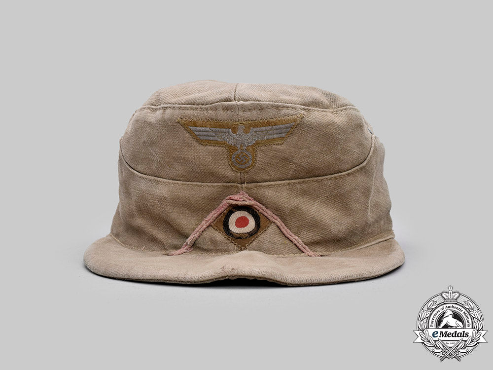 germany,_heer._an_afrikakorps_panzer_em/_nco’s_m43_field_cap,_by_carl_halfar_c2021_173_mnc5357