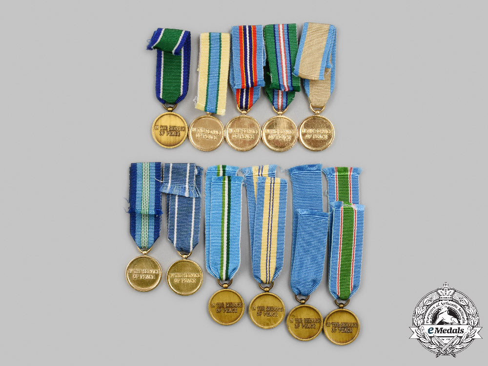 united_nations._lot_of_eleven_miniature_medals_c2021_252emd_7301