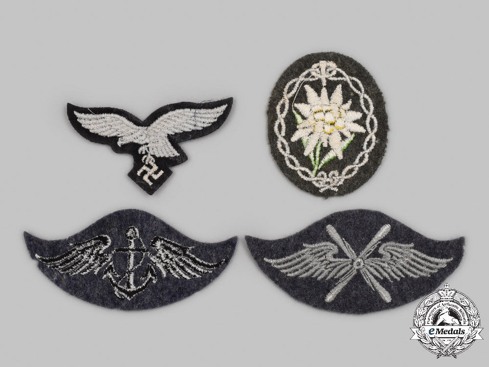 germany,_wehrmacht._a_mixed_lot_of_uniform_insignia_c2021_432emd_5208