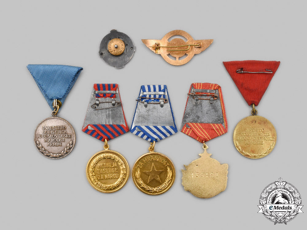 yugoslavia,_socialist_federal_republic._a_lot_of_seven_medals_and_badges_c2021_545emd_4104_1