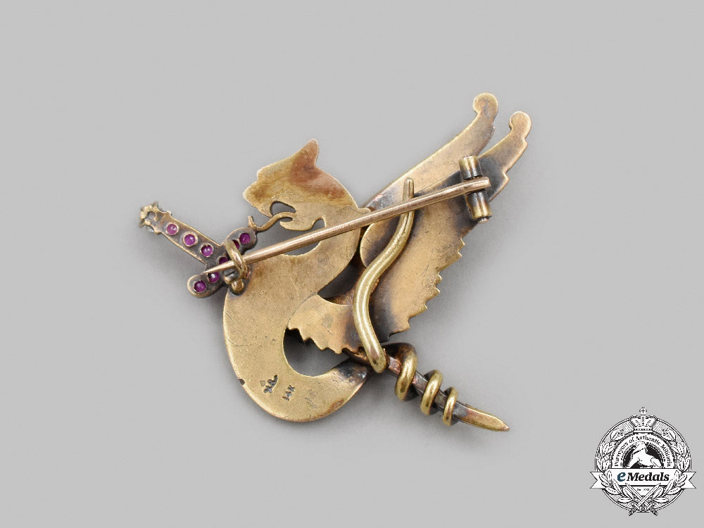 united_states._a_yellow_gold,_ruby,_diamonds&_peridot_winged_dragon_brooch,_by_riker_brothers,_c.1900_c2021_939emd_5023_1_1