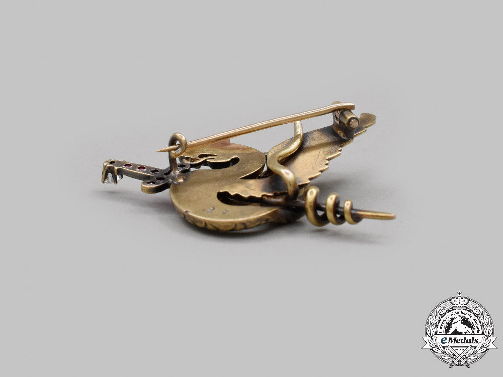 united_states._a_yellow_gold,_ruby,_diamonds&_peridot_winged_dragon_brooch,_by_riker_brothers,_c.1900_c2021_941emd_5027_1_1