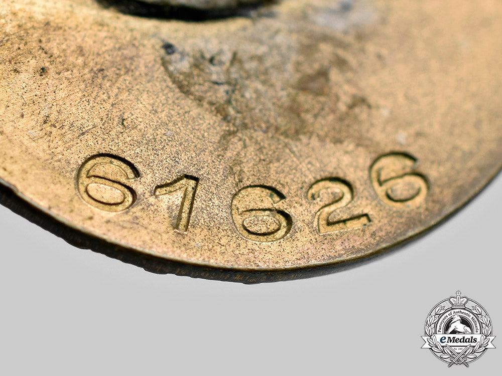 germany,_nsdap._a_golden_party_badge,_small_version,_by_josef_fuess_c20261_mnc8374_1