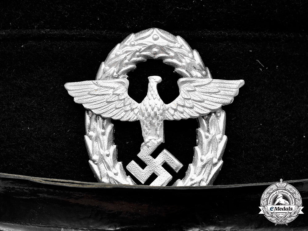 germany,_feuerschutzpolizei._an_em/_nco’s_visor_cap,_by_georg_riede_c20502_mnc8831_1_1
