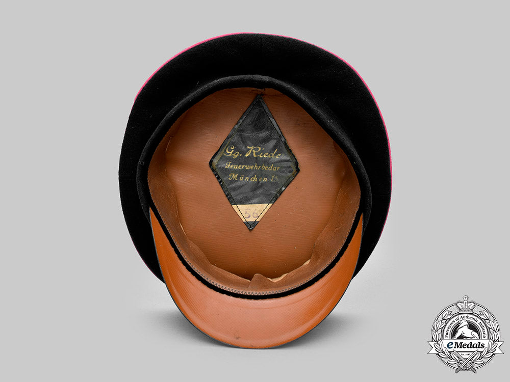germany,_feuerschutzpolizei._an_em/_nco’s_visor_cap,_by_georg_riede_c20503_mnc8833_1_1