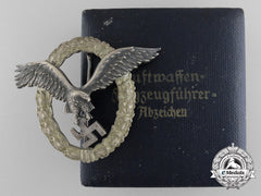 An Early Cased Luftwaffe Pilot’s Badge By Juncker; J-1