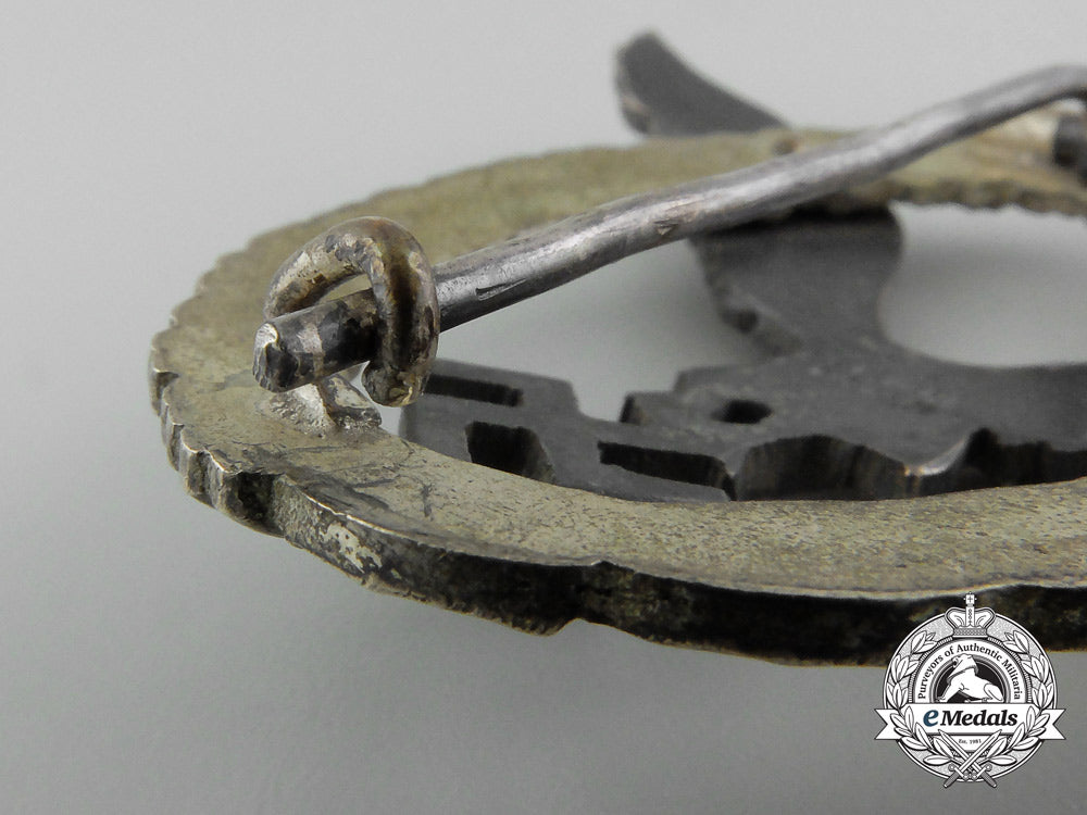 an_early_cased_luftwaffe_pilot’s_badge_by_juncker;_j-1_c_3211