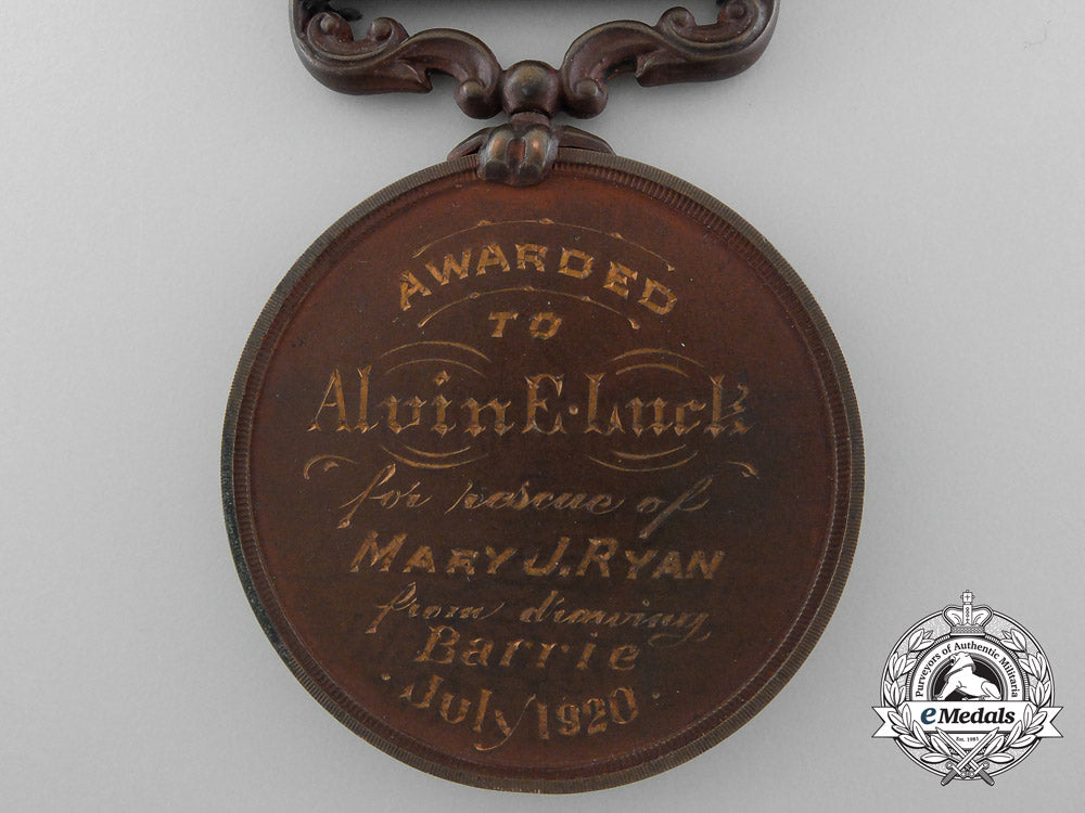 a_royal_canadian_humane_association_life_saving_medal_to_alvin_e._luck_of_barrie,_ontario_c_3303_1
