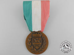 An Italian Medal For Financial Advisor To Somalia 1950 Bronze, 32 Mm, Original Ribbon, Oxidation Spots On The Reverse, Light Contact, Very Fine.