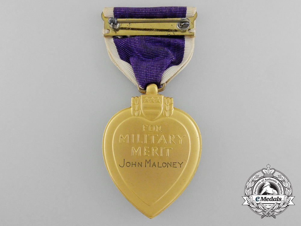 a_purple_heart_to_john_maloney_who_was_killed_in_action_during_a_kamikaze_attack_c_3884