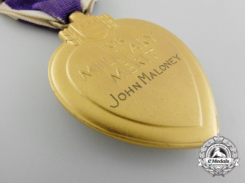 a_purple_heart_to_john_maloney_who_was_killed_in_action_during_a_kamikaze_attack_c_3886