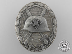 A German Second War Silver Grade Wound Badge By Carl Wild