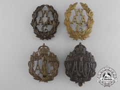 Four Woman’s Auxiliary Army Corps Cap Badges
