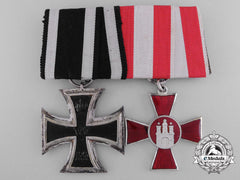 An First War Iron Cross & Hanseaten Medal Pair