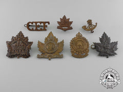 A Lot Of Seven Royal Canadian Military Cap Badges And Uniform Insignia