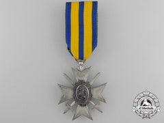A Schwarzburg-Sondershausen Honour Cross; Fourth Class With Swords