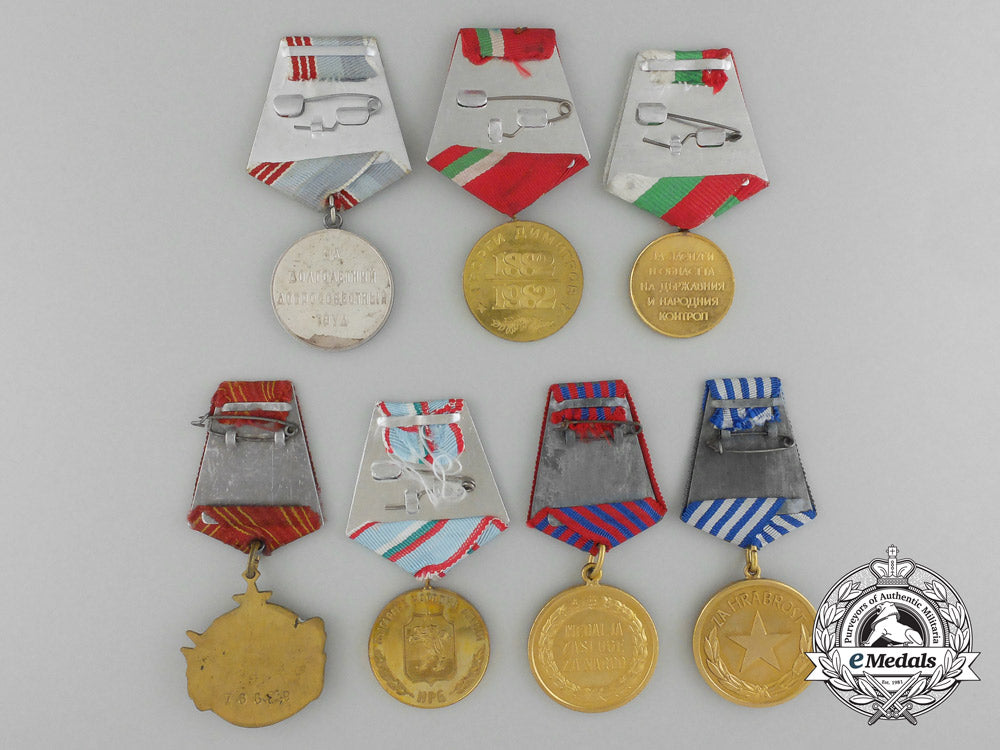 a_lot_of_seven_communist-_era_medals_c_5756
