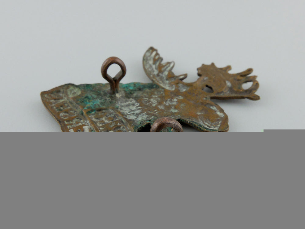 a_first_war_canadian4_th_mounted_rifle_battalion_cap_badge_c_634