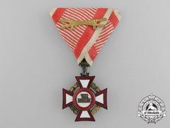 An Austrian Military Merit Cross With War Decoration