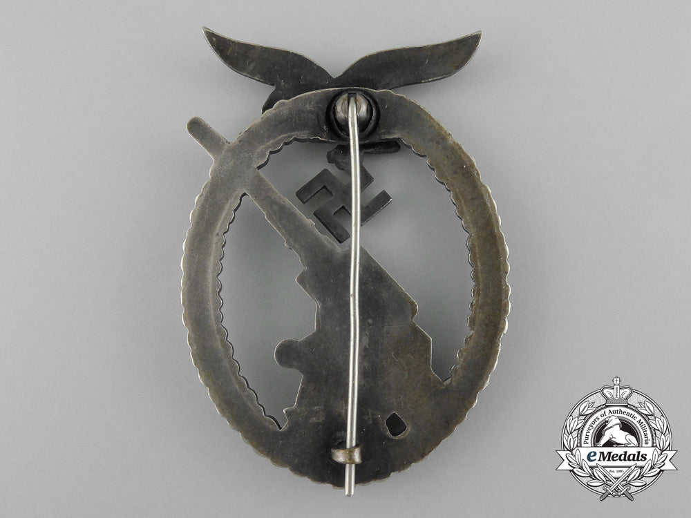 an_early_luftwaffe_flak_badge_in_tombac_with_ball_hinge_c_7354