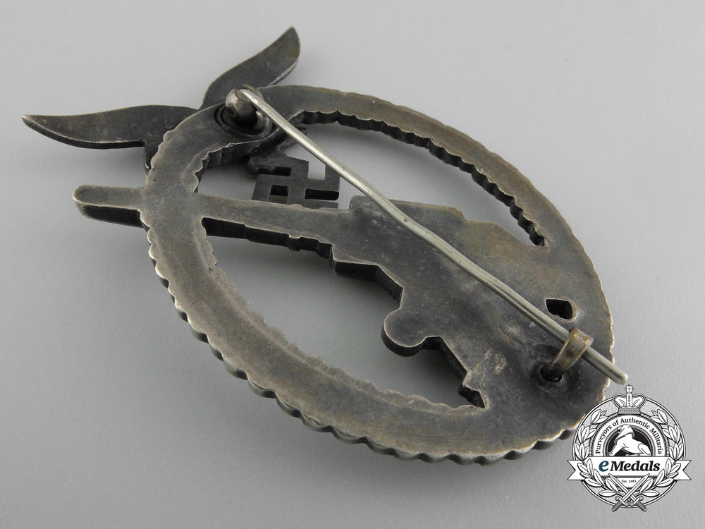 an_early_luftwaffe_flak_badge_in_tombac_with_ball_hinge_c_7356