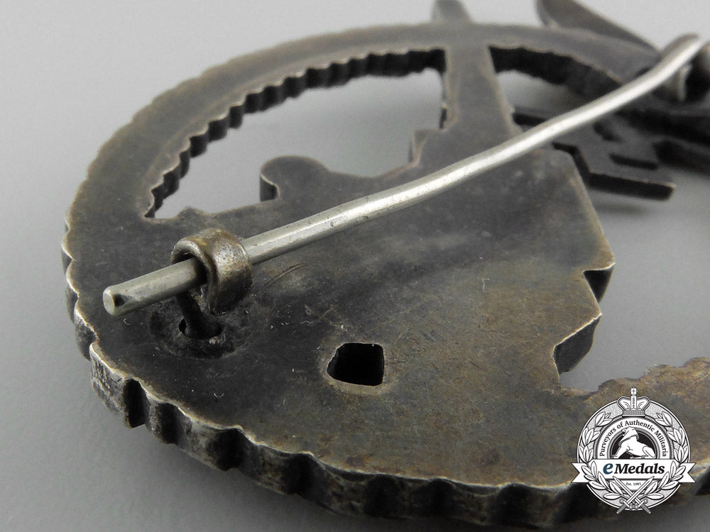 an_early_luftwaffe_flak_badge_in_tombac_with_ball_hinge_c_7357