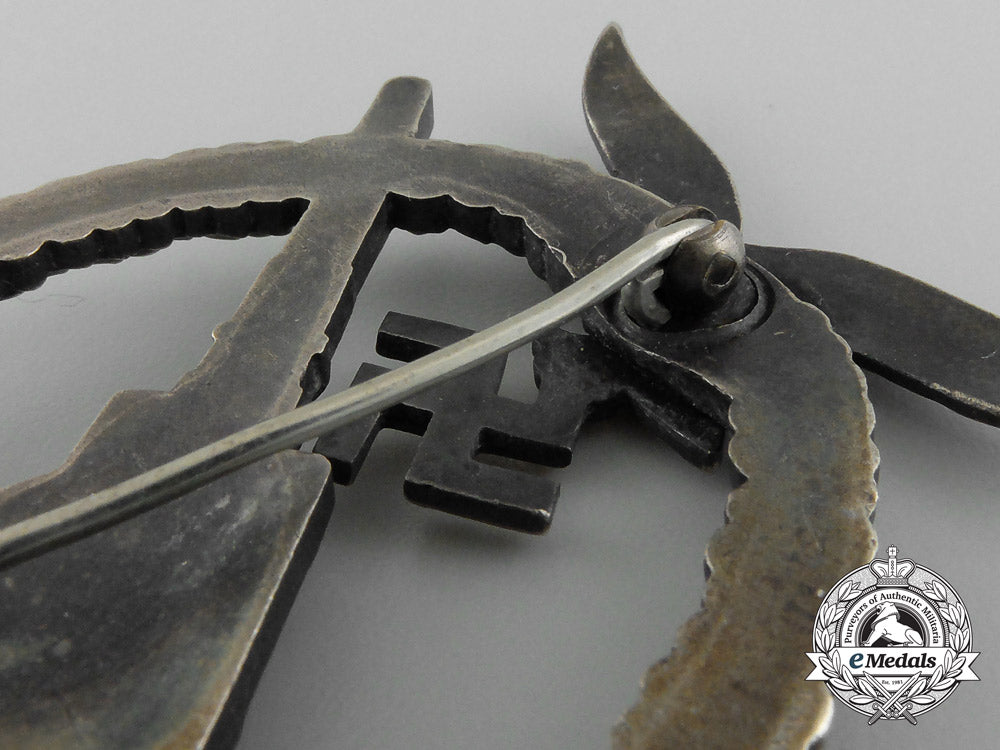 an_early_luftwaffe_flak_badge_in_tombac_with_ball_hinge_c_7358