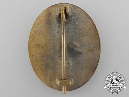 an_early_gold_grade_wound_badge;_marked30_c_7562