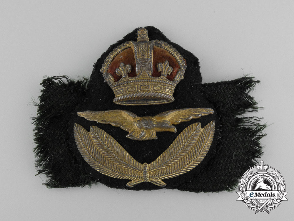 a1918_issued_royal_air_force(_raf)_officer's_cap_badge_below_air_rank_c_8285