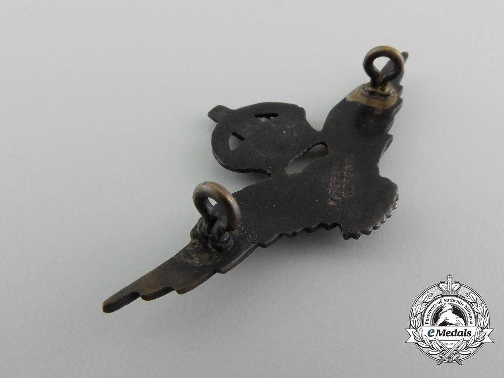a_scarce_canadian_made_royal_air_force(_raf)_officer’s_bronze_sleeve_eagle_c_8290