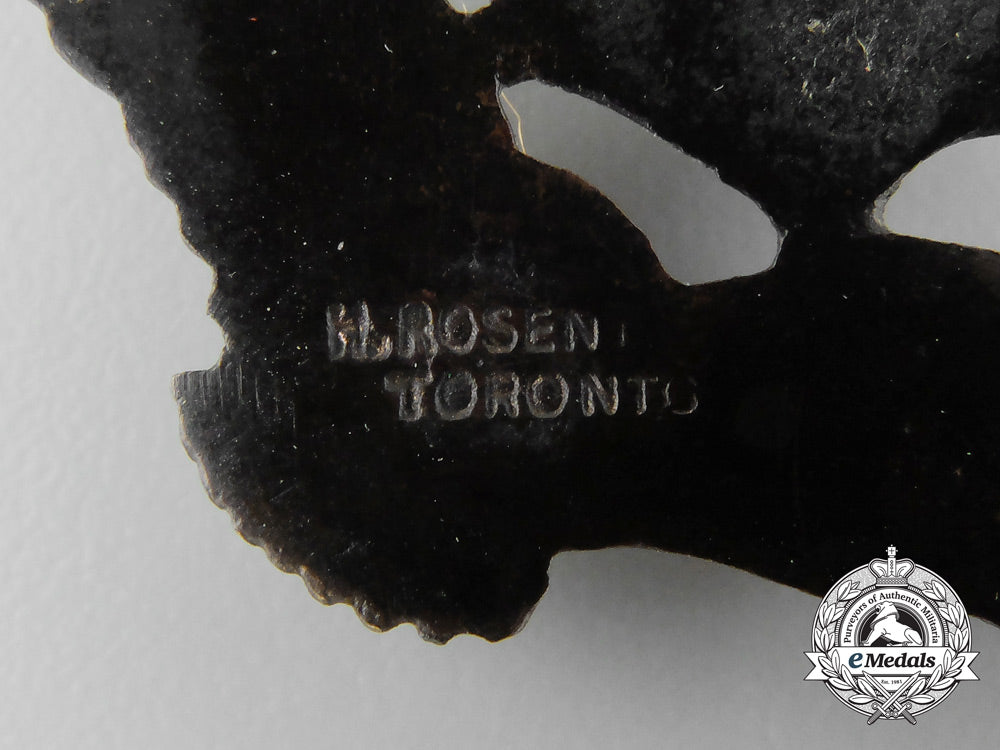 a_scarce_canadian_made_royal_air_force(_raf)_officer’s_bronze_sleeve_eagle_c_8291