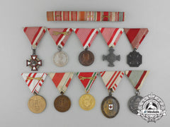 A Group Of Ten Austrian Medals With Ribbon Bar In A Presentation Case