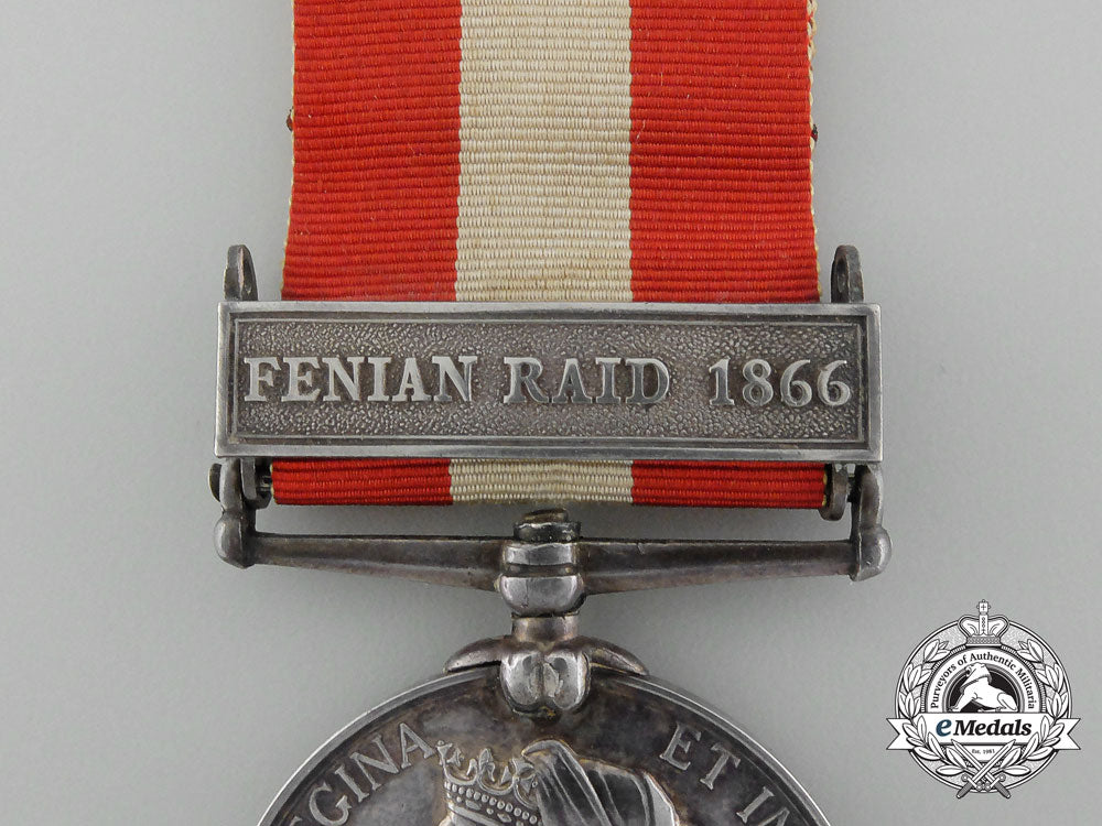 a_canada_general_service_medal_with_miniature,_photograph_of_recipient,&_carton_c_9556