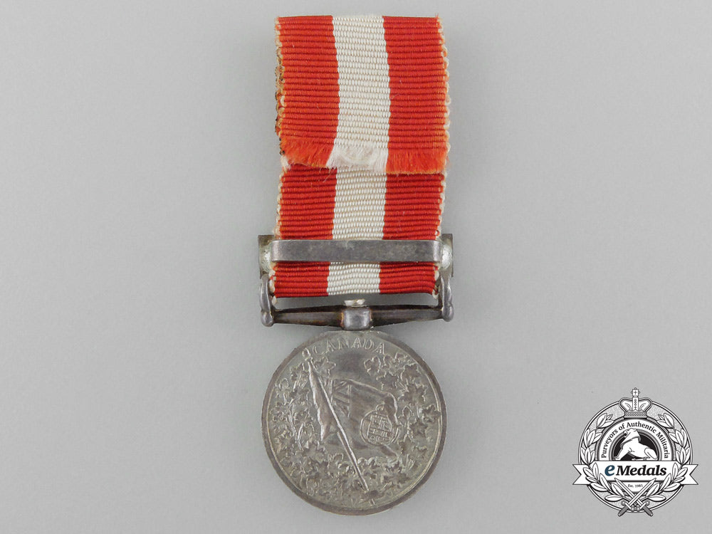 a_canada_general_service_medal_with_miniature,_photograph_of_recipient,&_carton_c_9560