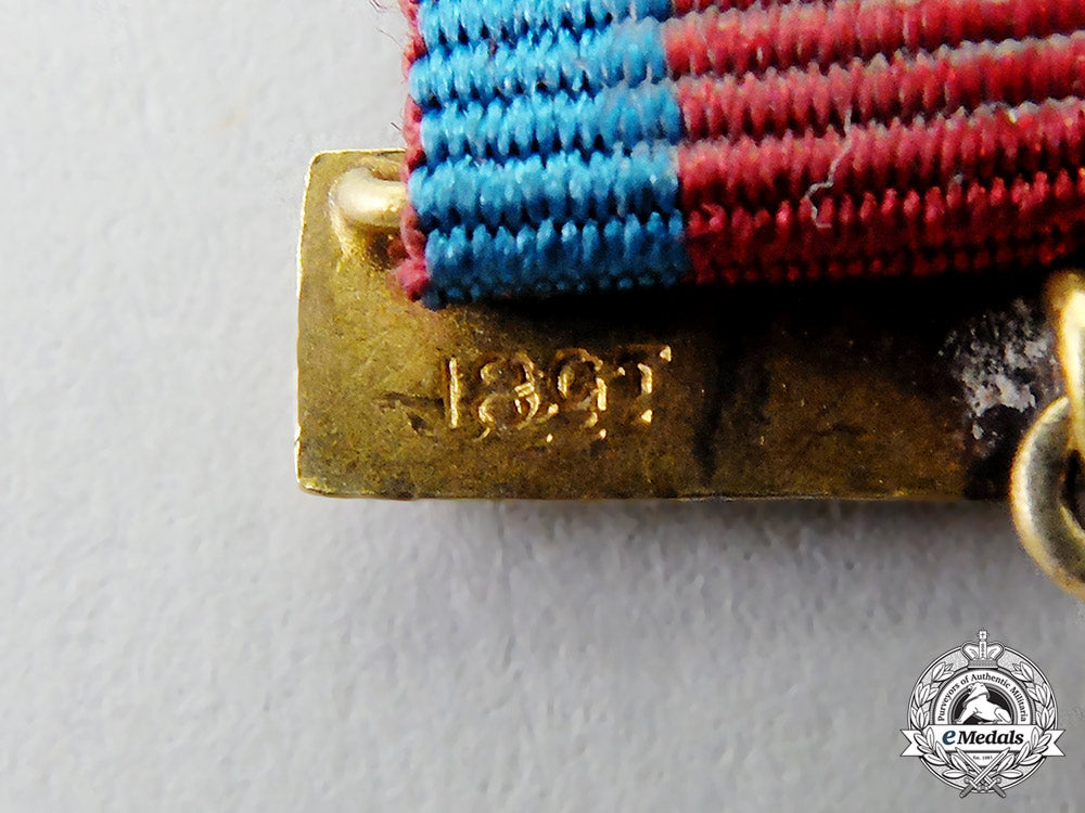 great_britain._a_miniature_gold_distinguished_service_order_with_bar_cc_7444
