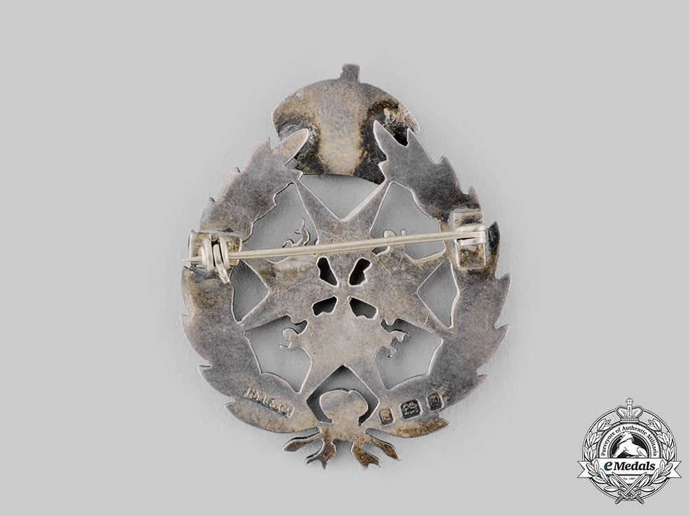 united_kingdom._an_order_of_st._john_lapel_badge,_by_h.t._lamb&_company_ci19_0368