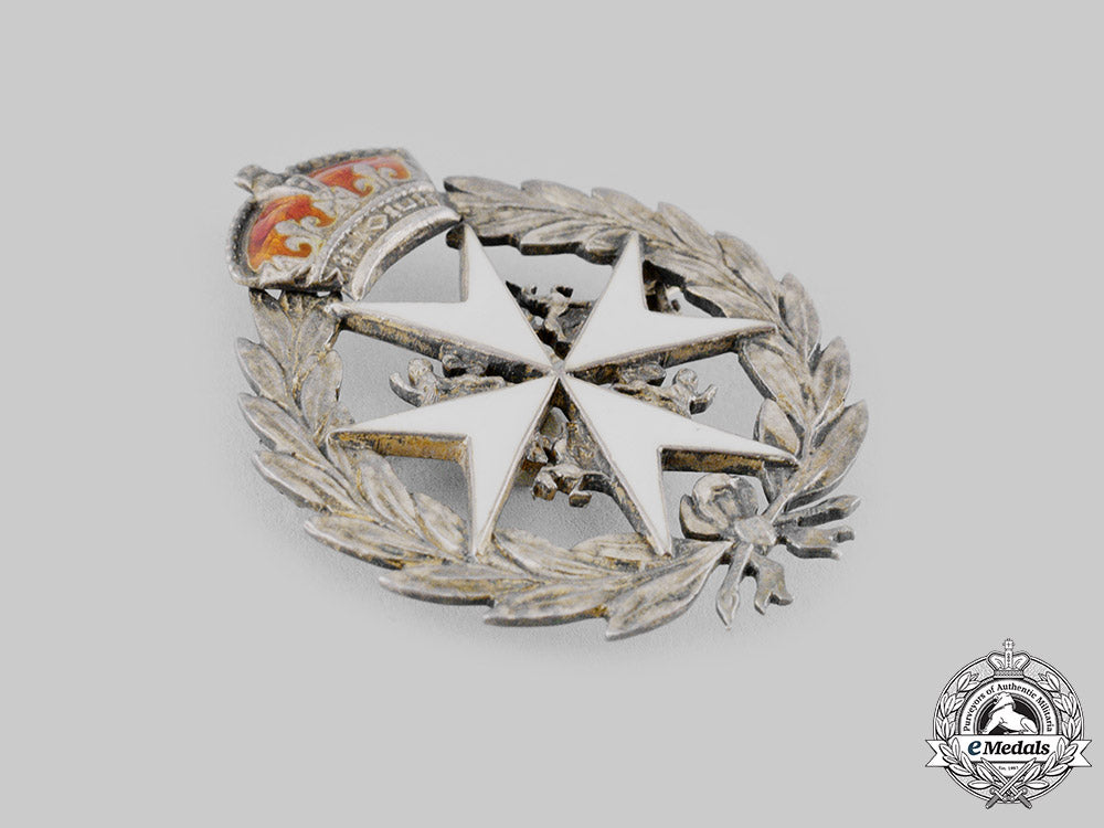 united_kingdom._an_order_of_st._john_lapel_badge,_by_h.t._lamb&_company_ci19_0369