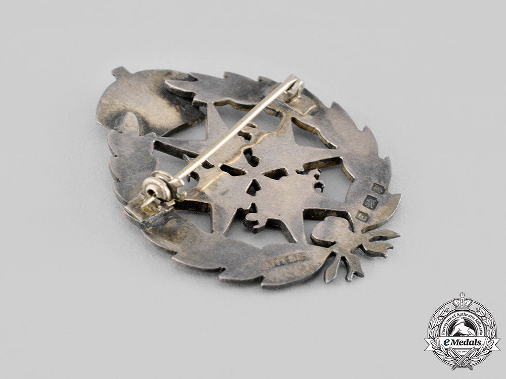 united_kingdom._an_order_of_st._john_lapel_badge,_by_h.t._lamb&_company_ci19_0370
