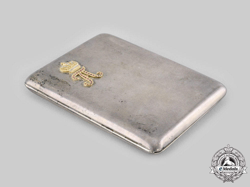 russia,_imperial._a_fine_silver_cigarette_case_featuring_tsar_alexander_cypher_in_gold_with_diamonds&_rubies_ci19_0431
