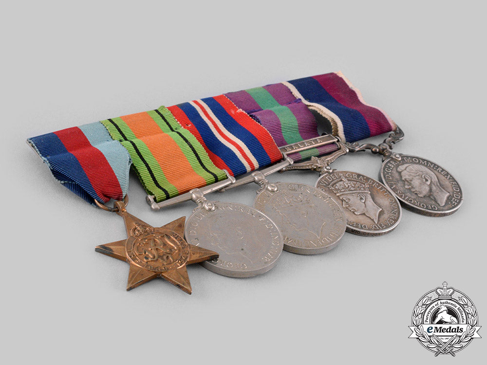 united_kingdom._a_long_service_medal_group_to_warrant_officer_g.e._jones,_royal_air_force_ci19_1925