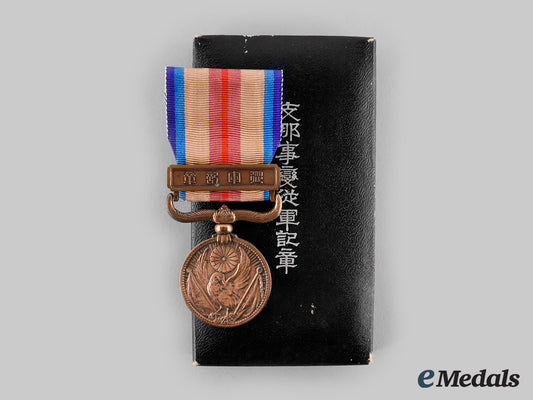 japan,_empire._a_china_incident_war_medal_with_case1937_ci19_4505_1_2_1